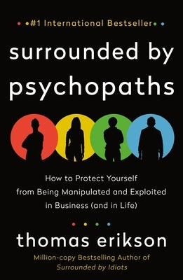 Paperback book titled "Surrounded by Psychopaths" from St. Martin's Essentials, featuring a cover with bold text and design elements.