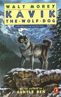 Paperback of Kavik the Wolf Dog by Puffin Books, showing the book cover with a wolf and snowy landscape illustration.