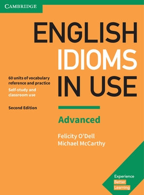 Paperback English idioms in use advanced book with answers by Cambridge University Press, featuring vocabulary reference and practice.