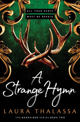 Paperback copy of "A Strange Hymn" by Bloom Books, featuring the book cover with dark, atmospheric artwork.