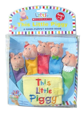Open page of "This Little Piggy" hand-puppet board book showing colorful illustrations and a soft piggy puppet attached.