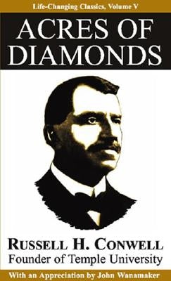 Paperback copy of "Acres of Diamonds" by Tremendous Life Books, featuring the book cover with title and author details.