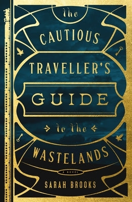 Paperback book titled "The Cautious Traveller's Guide to the Wastelands" by Flatiron Books, with a rugged wasteland cover illustration.