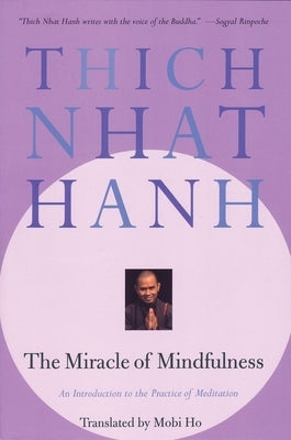 Paperback book titled "The Miracle of Mindfulness" by Beacon Press, featuring a calm, meditative scene on the cover.