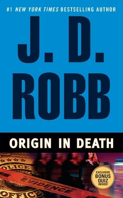 Mass market paperbound of "Origin in Death" by Berkley Books, featuring the book cover with dark, mysterious artwork.