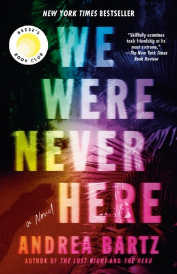 Paperback of "We Were Never Here" by Reese's Book Club, published by Ballantine Books, with a cover featuring bold typography and design.