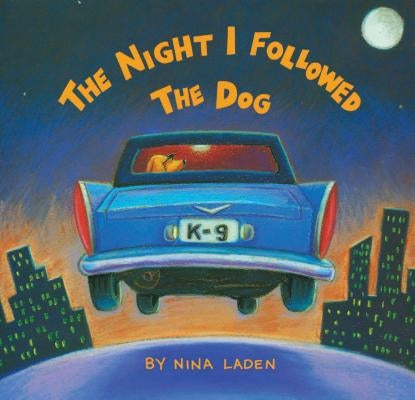 Paperback of "The Night I Followed the Dog" by Chronicle Books, featuring a colorful cover illustration.
