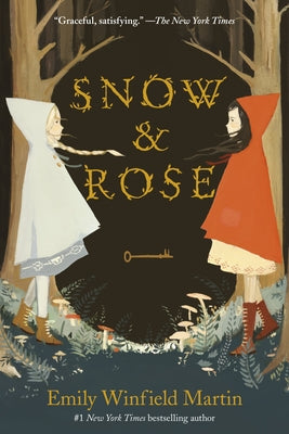 Paperback of Snow & Rose by Yearling Books featuring a whimsical fairy tale cover illustration.
