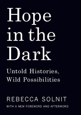 Paperback copy of "Hope in the Dark: Untold Histories, Wild Possibilities" by Haymarket Books, showing the book cover.