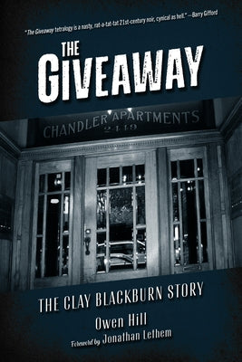 Paperback copy of "The Giveaway: The Clay Blackburn Story" by PM Press, with book cover featuring bold text and artwork.