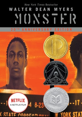Paperback copy of the novel "Monster" by Amistad Books for Young Readers, featuring a cover image with bold title design.