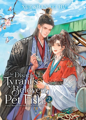 Paperback novel "The Disabled Tyrant's Beloved Pet Fish" Vol. 2 by Seven Seas, featuring colorful cover art with fish and fantasy themes.