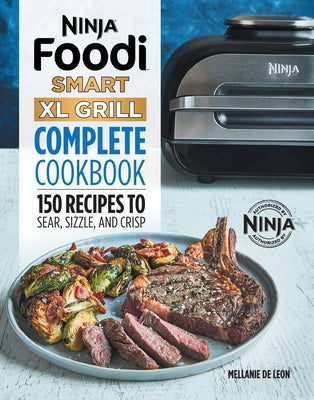 Callisto Ninja Foodi Smart XL Grill cookbook paperback with colorful recipe pages and images of grilled dishes.