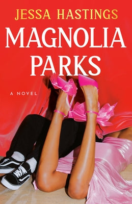 Paperback copy of Magnolia Parks novel by Dutton, featuring the book cover with artistic floral design.