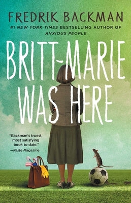 Paperback of Britt-Marie Was Here by Atria Books, showing the book cover with colorful artwork and title.