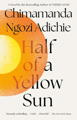 Paperback of "Half of a Yellow Sun" by Vintage, showing the book cover with yellow and black design elements.