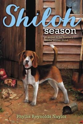 Cover of the paperback book "Shiloh" by Atheneum Books for Young Readers, featuring a young boy and a dog on the front.
