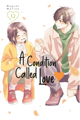 Paperback copy of "A Condition Called Love 12" by Kodansha Comics with colorful cover art featuring anime-style characters.