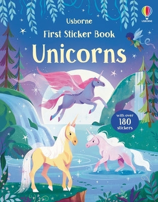 Open paperback of Usborne Books First Sticker Book Unicorns with colorful unicorn-themed stickers on white background.