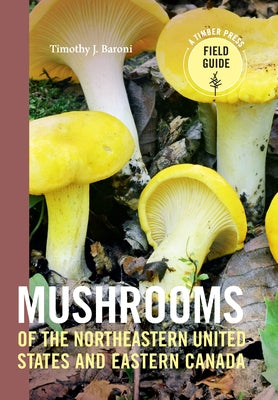 Paperback book titled "Mushrooms of the Northeastern United States and Eastern Canada," showing colorful mushroom illustrations.