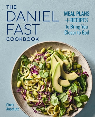 Paperback copy of The Daniel Fast Cookbook by Callisto featuring meal plans and recipes for spiritual fasting and healthy eating.
