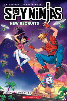 Paperback graphic novel "Spy Ninjas Official New Recruits" by Graphix, featuring colorful cover art with spy characters.