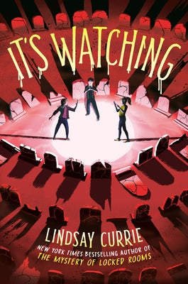 Paperback copy of "It's Watching" by Delacorte Press, featuring the book cover with title and author details.