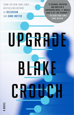 Paperback copy of the book "Upgrade" by Ballantine Books with a colorful cover featuring abstract artwork.