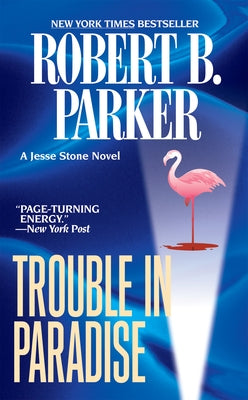 Mass market paperback of "Trouble in Paradise" by G.P. Putnam's Sons featuring a colorful cover design.