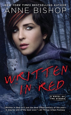 Mass market paperback of "Written in Red" by Ace Books featuring the book cover with red title text and fictional artwork.