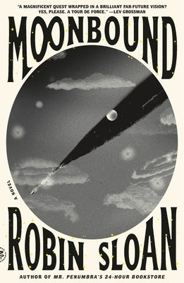 Paperback of Moonbound novel by Picador USA, showing the book cover with dark moon-themed artwork and title text.