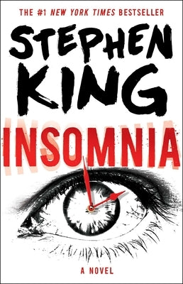 Paperback copy of "Insomnia" by Scribner Book Company, featuring a dark cover with the title and author's name visible.
