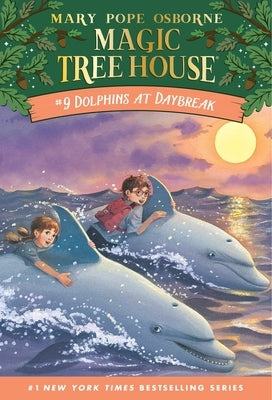 Paperback book titled Dolphins at Daybreak by Random House Books for Young Readers, featuring an underwater dolphin scene on the cover.