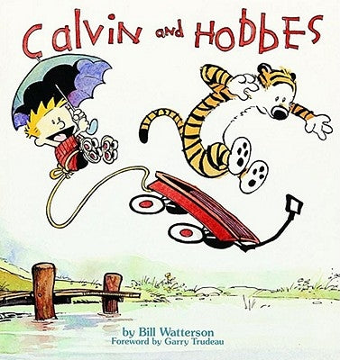 Paperback Calvin and Hobbes comic book by Andrews McMeel Publishing featuring colorful cartoon illustrations of Calvin and his tiger.