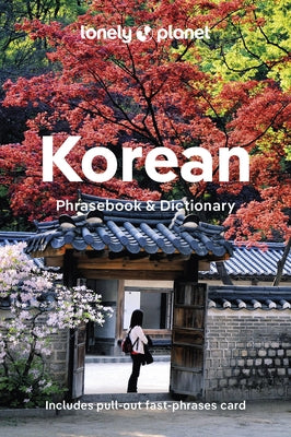 Lonely Planet Korean Phrasebook and Dictionary paperback, showing colorful cover and sample Korean phrases inside.