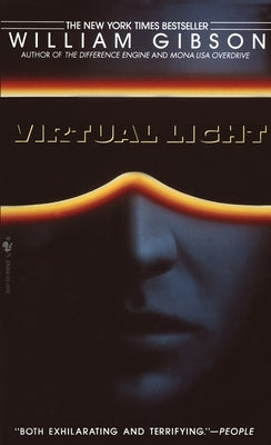 Mass market paperback of "Virtual Light" by Spectra Books, featuring the book cover with title and author details.