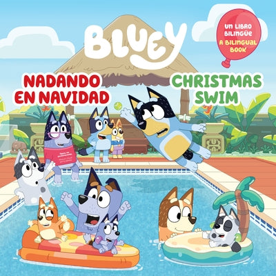 Bilingual Bluey Christmas swim paperback book by Penguin Young Readers Licenses with colorful cover featuring Bluey in holiday swimwear.