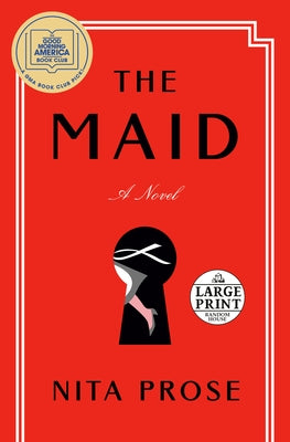 Paperback copy of "The Maid" by Random House Large Print Publishing, showing the book cover with title and author text.