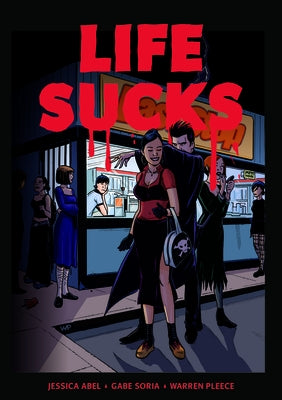Paperback of "Life Sucks" comic book by Fantagraphics Books, featuring colorful cover art and illustrative design.
