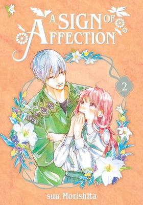 Paperback manga titled "A Sign of Affection 2" by Kodansha Comics, featuring cover art with characters in a tender scene.