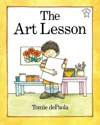 Paperback copy of The Art Lesson by Puffin Books featuring colorful cover art with children painting and drawing.