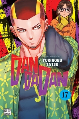 Paperback copy of Dandadan, Vol. 17 manga by Viz Media featuring colorful cover art with characters from the series.