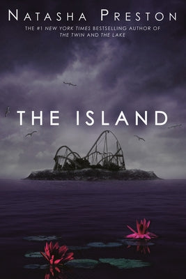 Paperback of "The Island" by Delacorte Press, featuring a cover with tropical island scenery and ocean waves.
