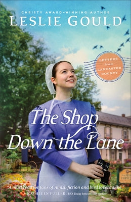 Paperback of "The Shop Down the Lane" by Bethany House Publishers featuring a cozy book cover with warm colors and charming illustrations.