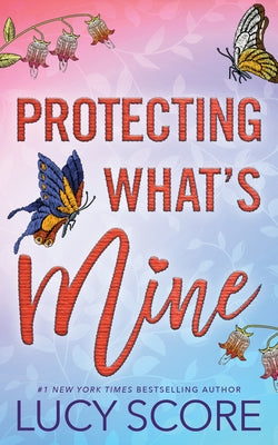 Paperback of Protecting What's Mine by Bloom Books, featuring the book cover with title and author details.