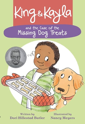 Paperback of "King & Kayla and the Case of the Missing Dog Treats" by Peachtree Publishers, showing the book cover with illustrations.