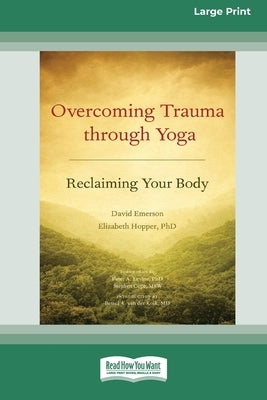 Paperback book titled "Overcoming Trauma Through Yoga: Reclaiming Your Body" in large print with a plain cover and title text.