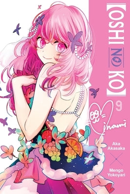 Paperback of Oshi No Ko Vol. 9 manga by Yen Press featuring cover art with characters in vibrant colors and detailed illustrations.