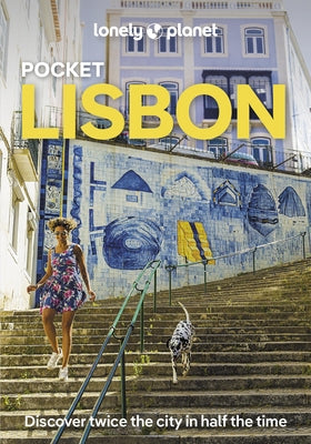 Paperback Lonely Planet Pocket Lisbon travel guide with colorful cover, featuring city map and key landmarks.