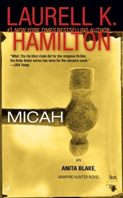 Mass market paperback of "Micah" by Berkley Books, an Anita Blake Vampire Hunter novel, showing the book cover with title and author.